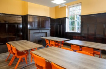 Abbey School - interior school room wood panels